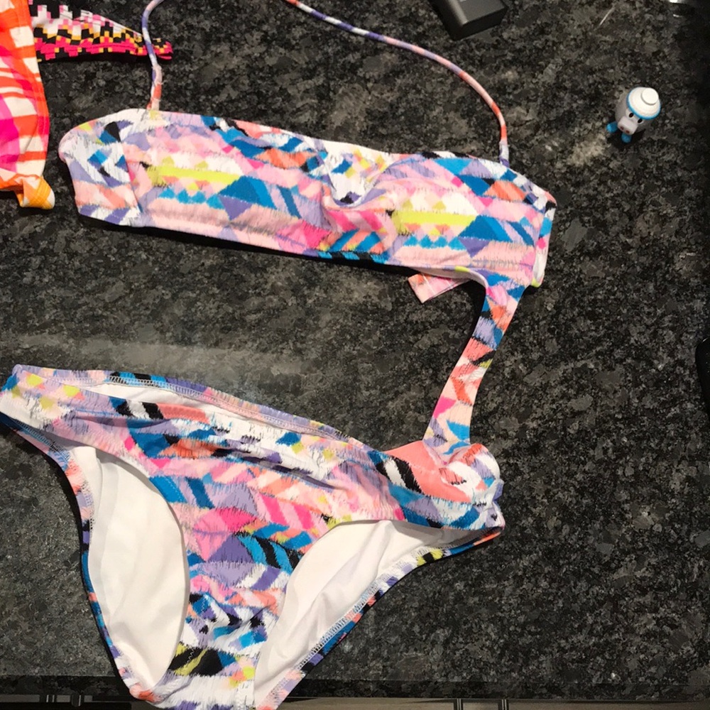 Lot of Swim tops. All size small.